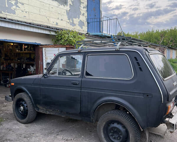 Черный ВАЗ 2121 Нива, объемом двигателя 1.6 л и пробегом 100 тыс. км за 950 $, фото 1 на Automoto.ua