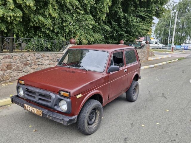 Красный ВАЗ 2121, объемом двигателя 2 л и пробегом 234 тыс. км за 750 $, фото 1 на Automoto.ua