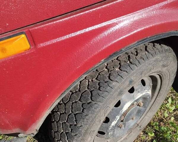 Красный ВАЗ 2121 Нива, объемом двигателя 1.6 л и пробегом 180 тыс. км за 1060 $, фото 7 на Automoto.ua