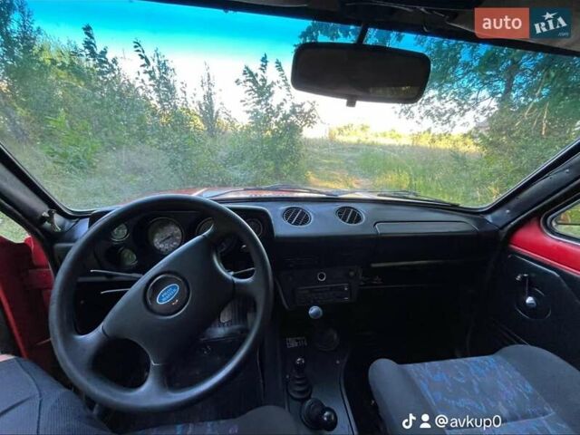 Красный ВАЗ 2121 Нива, объемом двигателя 1.6 л и пробегом 200 тыс. км за 1350 $, фото 12 на Automoto.ua