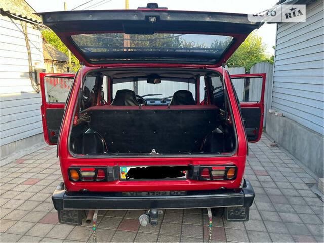 Красный ВАЗ 2121 Нива, объемом двигателя 1.6 л и пробегом 90 тыс. км за 3200 $, фото 1 на Automoto.ua