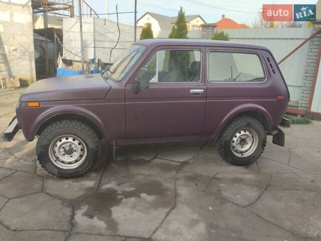 Красный ВАЗ 2121 Нива, объемом двигателя 1.6 л и пробегом 100 тыс. км за 3300 $, фото 1 на Automoto.ua