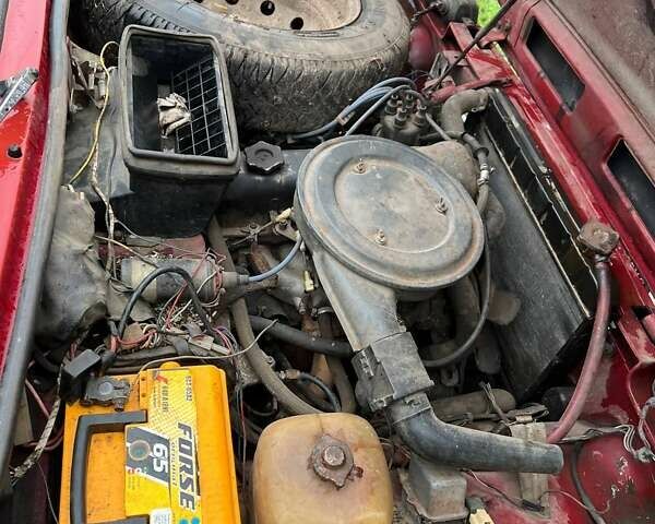 Красный ВАЗ 2121 Нива, объемом двигателя 1.6 л и пробегом 100 тыс. км за 2497 $, фото 1 на Automoto.ua