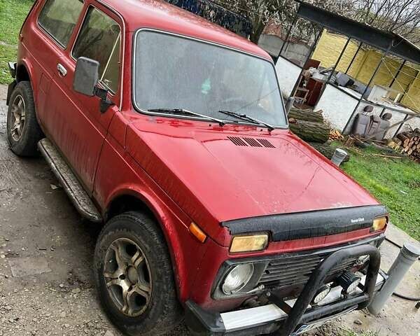 Красный ВАЗ 2121 Нива, объемом двигателя 1.6 л и пробегом 100 тыс. км за 2497 $, фото 2 на Automoto.ua