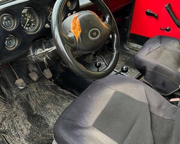 Красный ВАЗ 2121 Нива, объемом двигателя 1.6 л и пробегом 100 тыс. км за 2497 $, фото 5 на Automoto.ua
