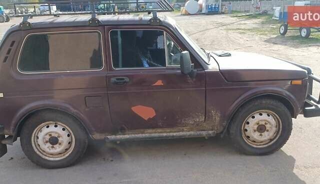 Красный ВАЗ 2121 Нива, объемом двигателя 1.6 л и пробегом 270 тыс. км за 1400 $, фото 3 на Automoto.ua