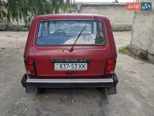 Красный ВАЗ 2121 Нива, объемом двигателя 1.7 л и пробегом 208 тыс. км за 2600 $, фото 2 на Automoto.ua