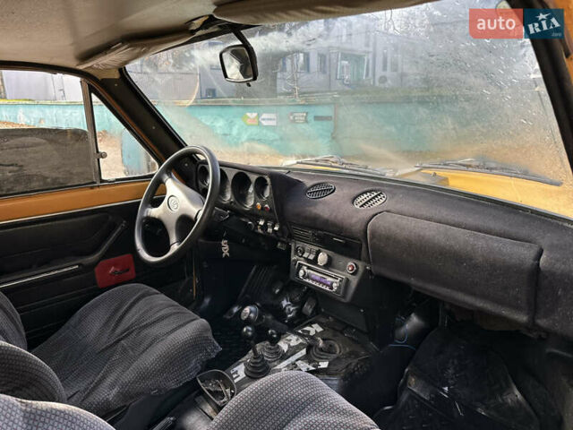 Желтый ВАЗ 2121 Нива, объемом двигателя 1.6 л и пробегом 250 тыс. км за 2950 $, фото 13 на Automoto.ua