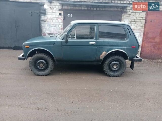 Синий ВАЗ 2121 Нива, объемом двигателя 1.6 л и пробегом 250 тыс. км за 2700 $, фото 1 на Automoto.ua