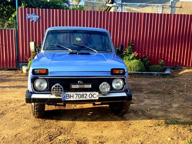 Синий ВАЗ 2121 Нива, объемом двигателя 1.6 л и пробегом 100 тыс. км за 2400 $, фото 1 на Automoto.ua