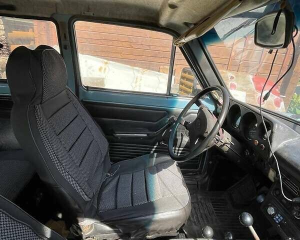 Синий ВАЗ 2121 Нива, объемом двигателя 1.57 л и пробегом 150 тыс. км за 1500 $, фото 5 на Automoto.ua