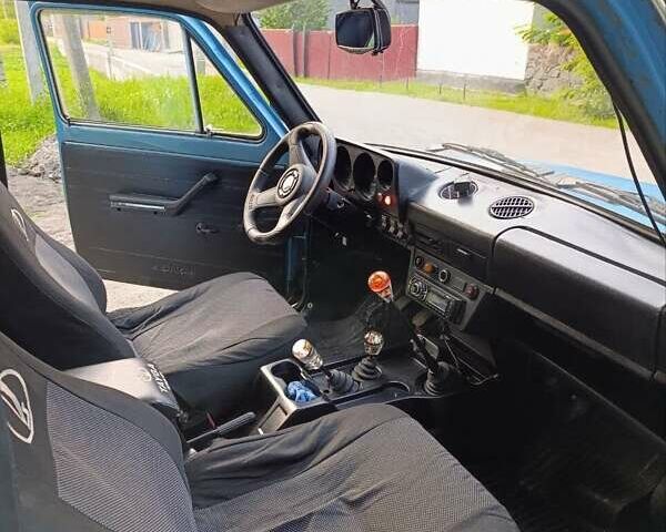 Синий ВАЗ 2121 Нива, объемом двигателя 1.6 л и пробегом 75 тыс. км за 2300 $, фото 4 на Automoto.ua