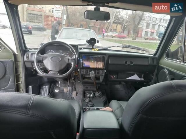 Зеленый ВАЗ 2121 Нива, объемом двигателя 1.6 л и пробегом 500 тыс. км за 5000 $, фото 3 на Automoto.ua