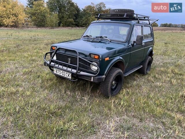 Зеленый ВАЗ 2121 Нива, объемом двигателя 1.6 л и пробегом 200 тыс. км за 2200 $, фото 1 на Automoto.ua