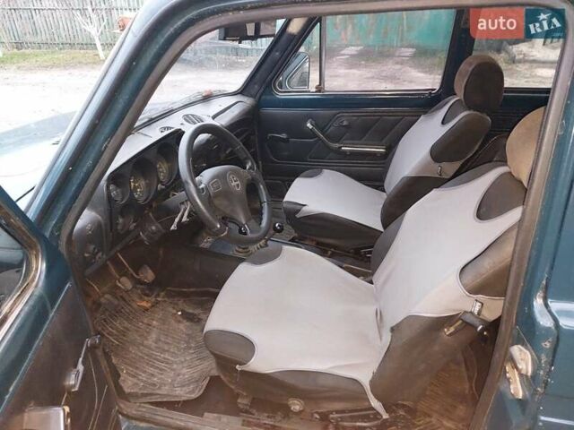 Зеленый ВАЗ 2121 Нива, объемом двигателя 1.57 л и пробегом 111 тыс. км за 2000 $, фото 3 на Automoto.ua
