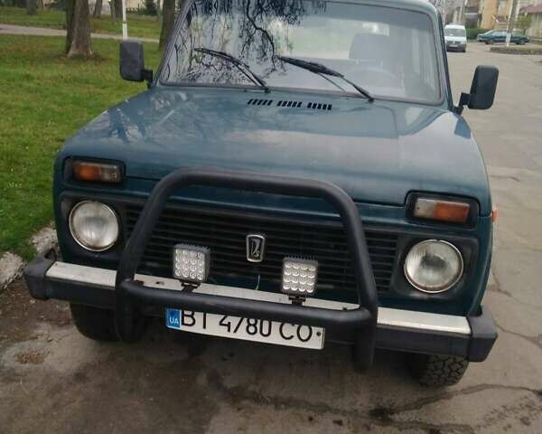 Зеленый ВАЗ 2121 Нива, объемом двигателя 1.57 л и пробегом 229 тыс. км за 4199 $, фото 2 на Automoto.ua