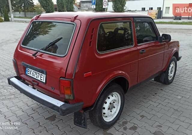Красный ВАЗ 21213 Niva, объемом двигателя 1.7 л и пробегом 160 тыс. км за 2600 $, фото 1 на Automoto.ua