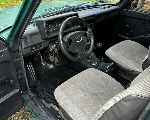 Зеленый ВАЗ 21213 Niva, объемом двигателя 1.69 л и пробегом 150 тыс. км за 1700 $, фото 1 на Automoto.ua