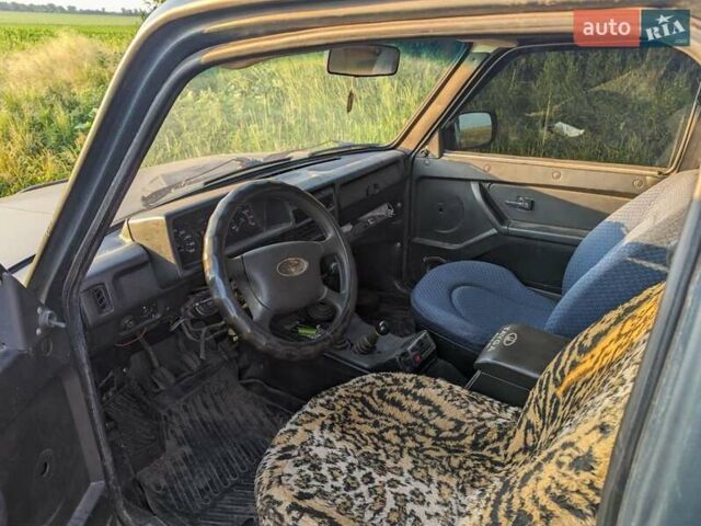 Зелений ВАЗ 21213 Niva, об'ємом двигуна 1.7 л та пробігом 450 тис. км за 3500 $, фото 1 на Automoto.ua