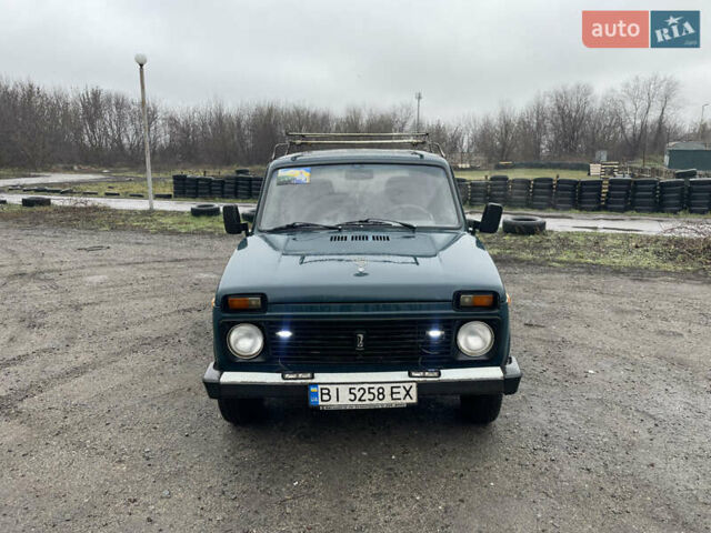 Зеленый ВАЗ 21213 Niva, объемом двигателя 1.7 л и пробегом 320 тыс. км за 1950 $, фото 1 на Automoto.ua