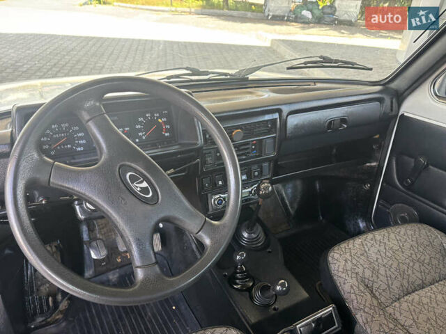Білий ВАЗ 21214, об'ємом двигуна 1.7 л та пробігом 157 тис. км за 2300 $, фото 13 на Automoto.ua