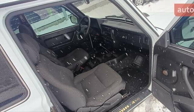 Белый ВАЗ 21214, объемом двигателя 1.69 л и пробегом 113 тыс. км за 4999 $, фото 3 на Automoto.ua