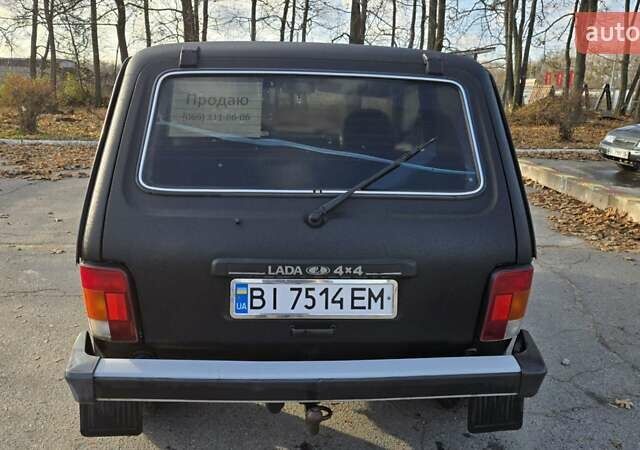 Черный ВАЗ 21214, объемом двигателя 1.69 л и пробегом 168 тыс. км за 4400 $, фото 3 на Automoto.ua