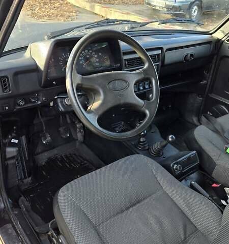 Черный ВАЗ 21214, объемом двигателя 1.69 л и пробегом 168 тыс. км за 4400 $, фото 6 на Automoto.ua