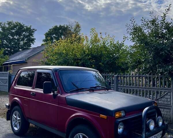 Красный ВАЗ 21214, объемом двигателя 1.7 л и пробегом 120 тыс. км за 2600 $, фото 2 на Automoto.ua