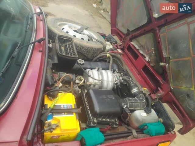 Красный ВАЗ 21214, объемом двигателя 1.69 л и пробегом 67 тыс. км за 3300 $, фото 6 на Automoto.ua