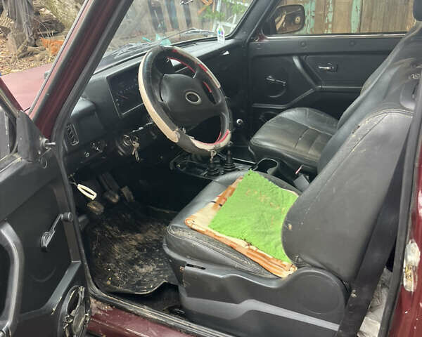 Красный ВАЗ 21214, объемом двигателя 1.69 л и пробегом 164 тыс. км за 3000 $, фото 12 на Automoto.ua