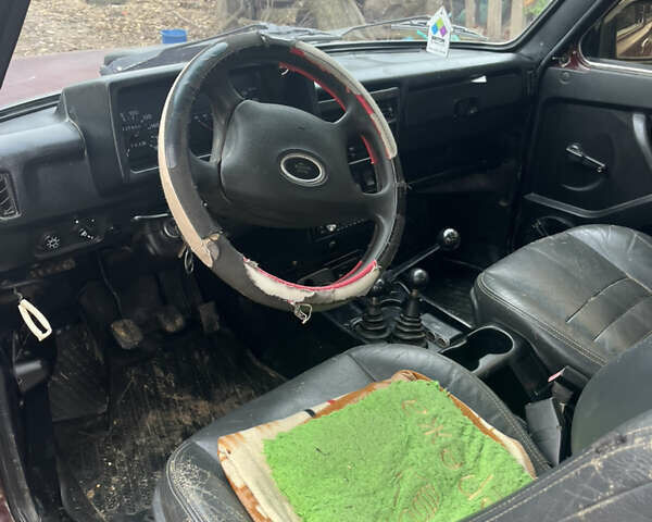 Красный ВАЗ 21214, объемом двигателя 1.69 л и пробегом 164 тыс. км за 3000 $, фото 9 на Automoto.ua