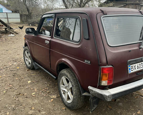 Красный ВАЗ 21214, объемом двигателя 1.69 л и пробегом 164 тыс. км за 3000 $, фото 1 на Automoto.ua