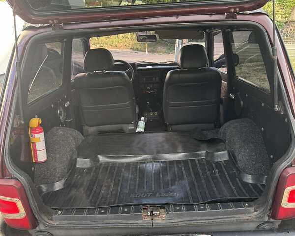 Красный ВАЗ 21214, объемом двигателя 1.7 л и пробегом 186 тыс. км за 4200 $, фото 25 на Automoto.ua