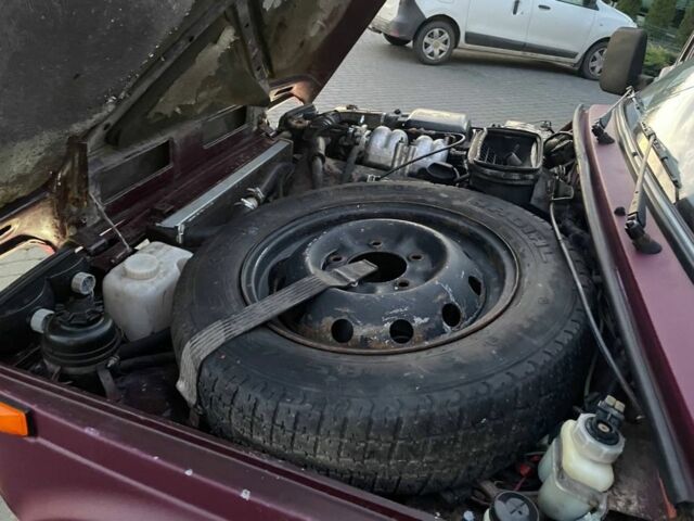 Красный ВАЗ 21214, объемом двигателя 1.7 л и пробегом 219 тыс. км за 2900 $, фото 5 на Automoto.ua