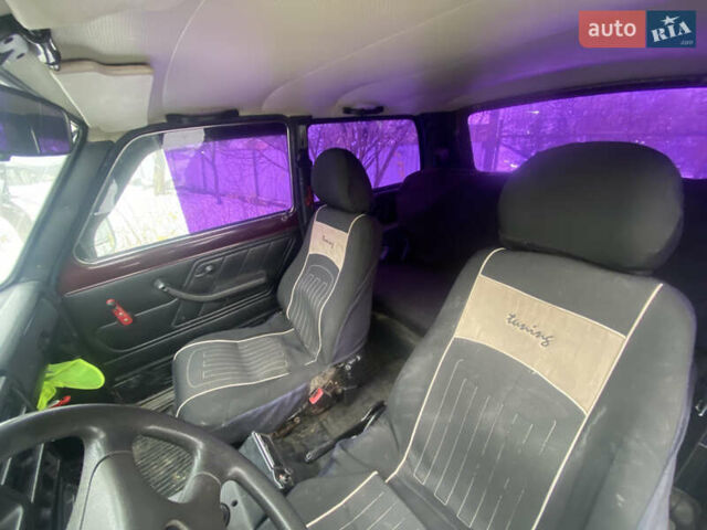 Красный ВАЗ 21214, объемом двигателя 1.7 л и пробегом 133 тыс. км за 4000 $, фото 5 на Automoto.ua