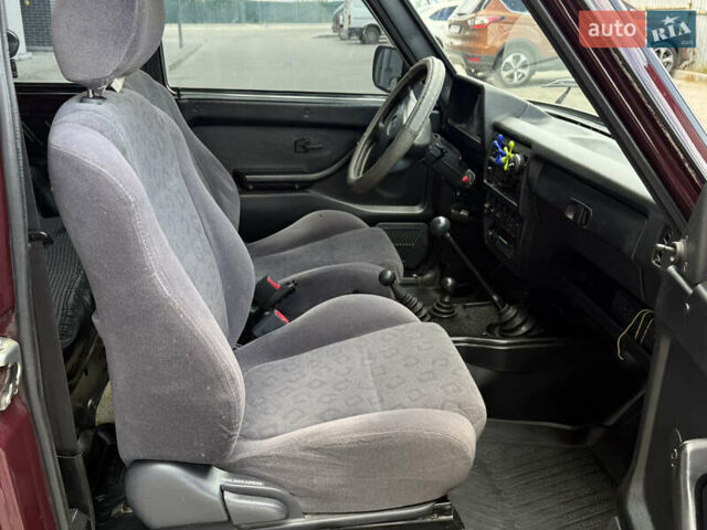 Червоний ВАЗ 21214, об'ємом двигуна 1.7 л та пробігом 60 тис. км за 4950 $, фото 25 на Automoto.ua
