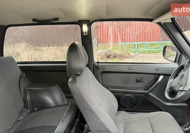 Красный ВАЗ 21214, объемом двигателя 1.69 л и пробегом 80 тыс. км за 3500 $, фото 11 на Automoto.ua