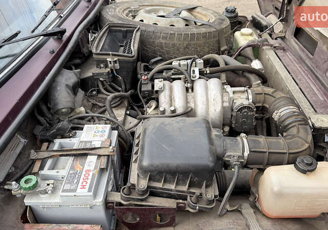 Красный ВАЗ 21214, объемом двигателя 1.69 л и пробегом 80 тыс. км за 3500 $, фото 12 на Automoto.ua