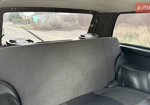 Красный ВАЗ 21214, объемом двигателя 1.69 л и пробегом 80 тыс. км за 3500 $, фото 10 на Automoto.ua