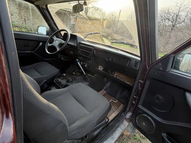 Красный ВАЗ 21214, объемом двигателя 1.7 л и пробегом 123 тыс. км за 5200 $, фото 5 на Automoto.ua