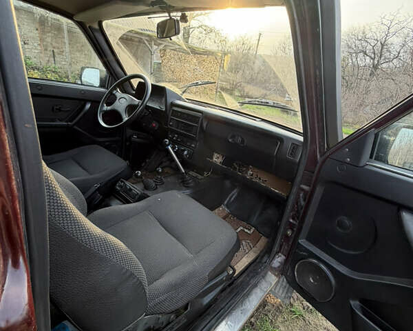 Красный ВАЗ 21214, объемом двигателя 1.7 л и пробегом 123 тыс. км за 4800 $, фото 10 на Automoto.ua