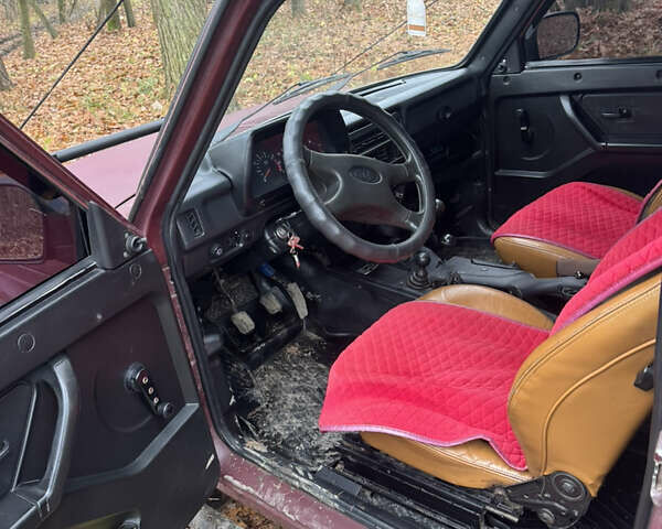 Красный ВАЗ 21214, объемом двигателя 1.7 л и пробегом 100 тыс. км за 4400 $, фото 8 на Automoto.ua