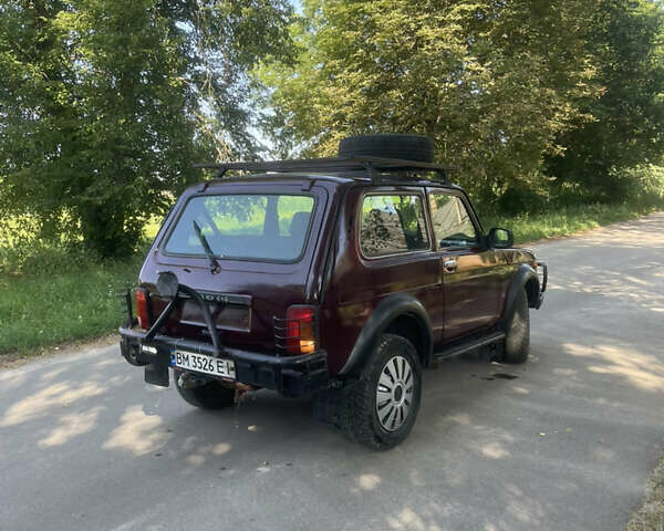Красный ВАЗ 21214, объемом двигателя 1.69 л и пробегом 167 тыс. км за 3200 $, фото 4 на Automoto.ua