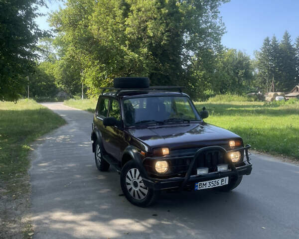 Красный ВАЗ 21214, объемом двигателя 1.69 л и пробегом 167 тыс. км за 3200 $, фото 1 на Automoto.ua