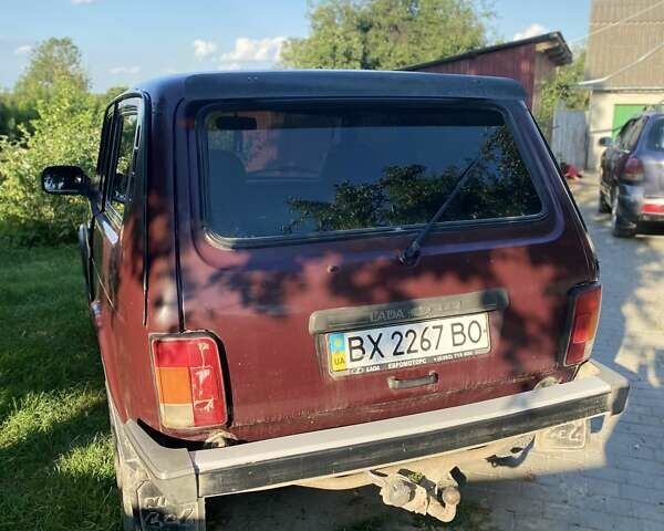 Красный ВАЗ 21214, объемом двигателя 1.69 л и пробегом 150 тыс. км за 3950 $, фото 2 на Automoto.ua
