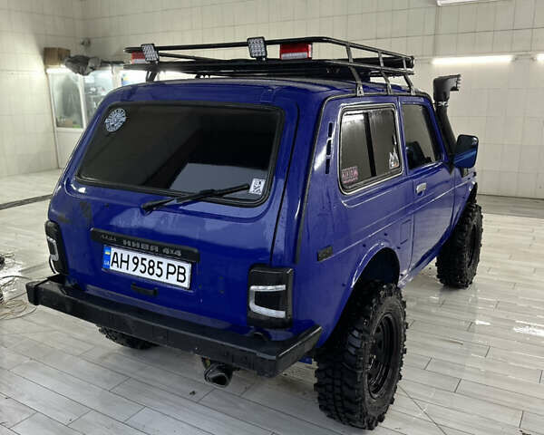 Синий ВАЗ 21214, объемом двигателя 1.7 л и пробегом 150 тыс. км за 3600 $, фото 2 на Automoto.ua