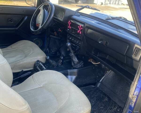 Синий ВАЗ 21214, объемом двигателя 1.7 л и пробегом 217 тыс. км за 3900 $, фото 11 на Automoto.ua