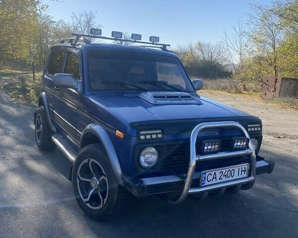 Синий ВАЗ 21214, объемом двигателя 1.7 л и пробегом 217 тыс. км за 3900 $, фото 1 на Automoto.ua