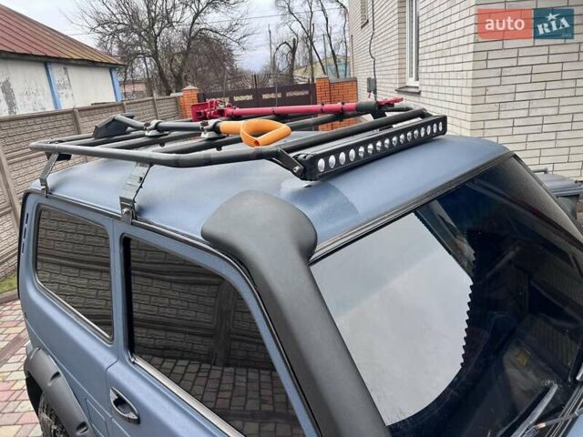 Синій ВАЗ 21214, об'ємом двигуна 1.7 л та пробігом 125 тис. км за 6000 $, фото 12 на Automoto.ua